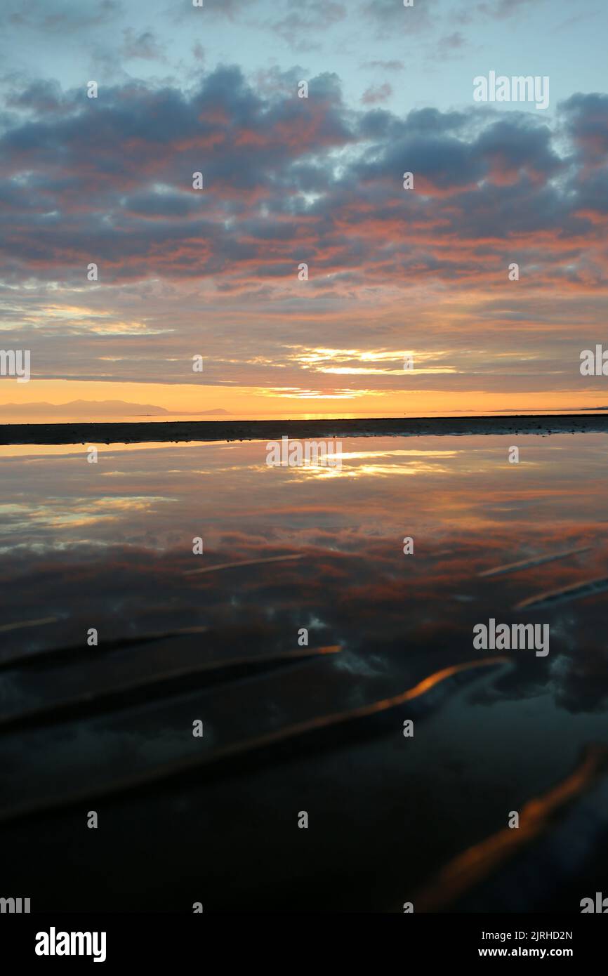 Prestwick, Ayrshire, Scotland, UK. The sun sets of the Firth of Clyde