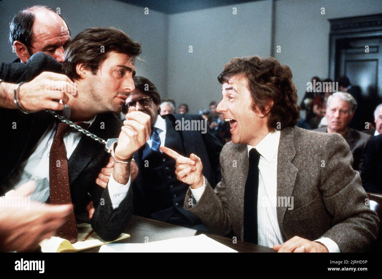 ARMAND ASSANTE, DUDLEY MOORE, UNFAITHFULLY YOURS, 1984 Stock Photo