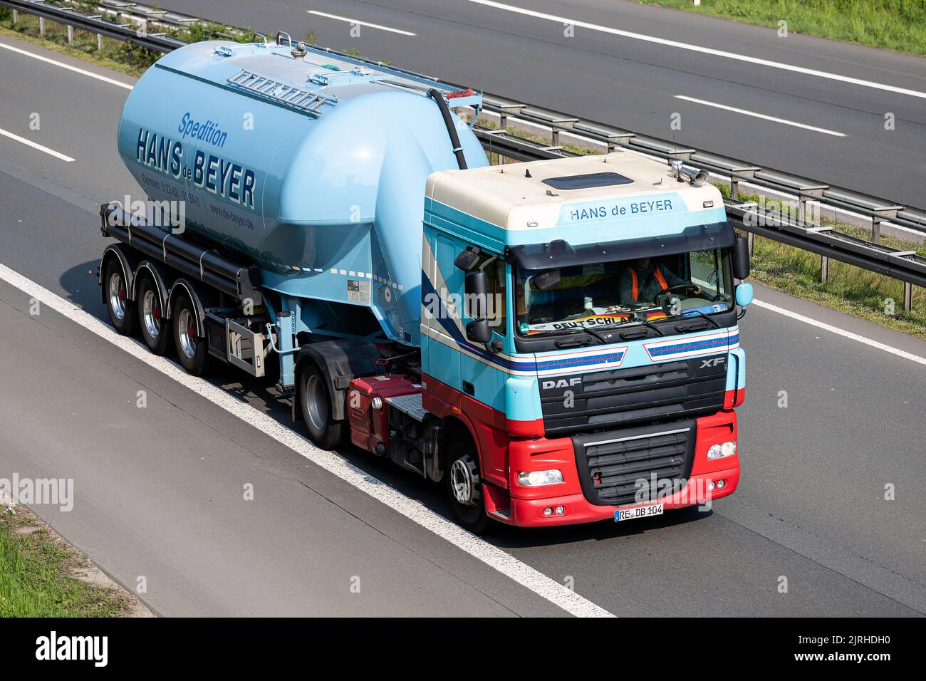 Hans de Beyer DAF XF truck with silo trailer on motorway Stock Photo
