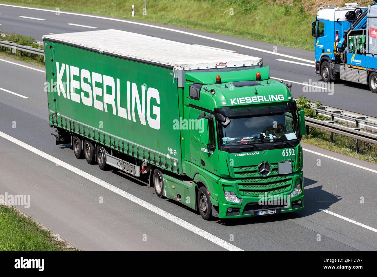 Kieserling Mercedes-Benz Actros truck with curtainside trailer on motorway Stock Photo