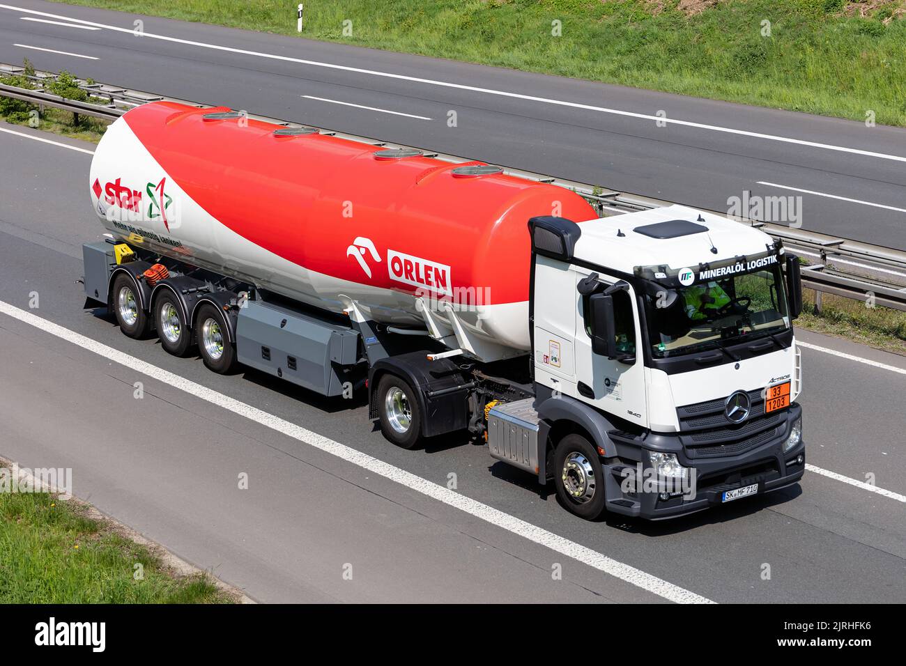 Mineralöl Logistik truck with star tank trailer on motorway Stock Photo