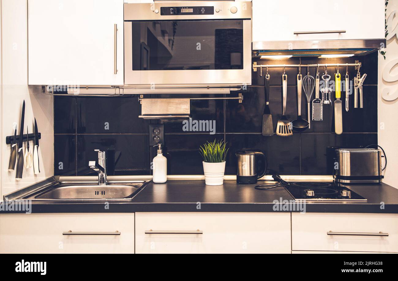 modern black and white kitchen interior Stock Photo - Alamy