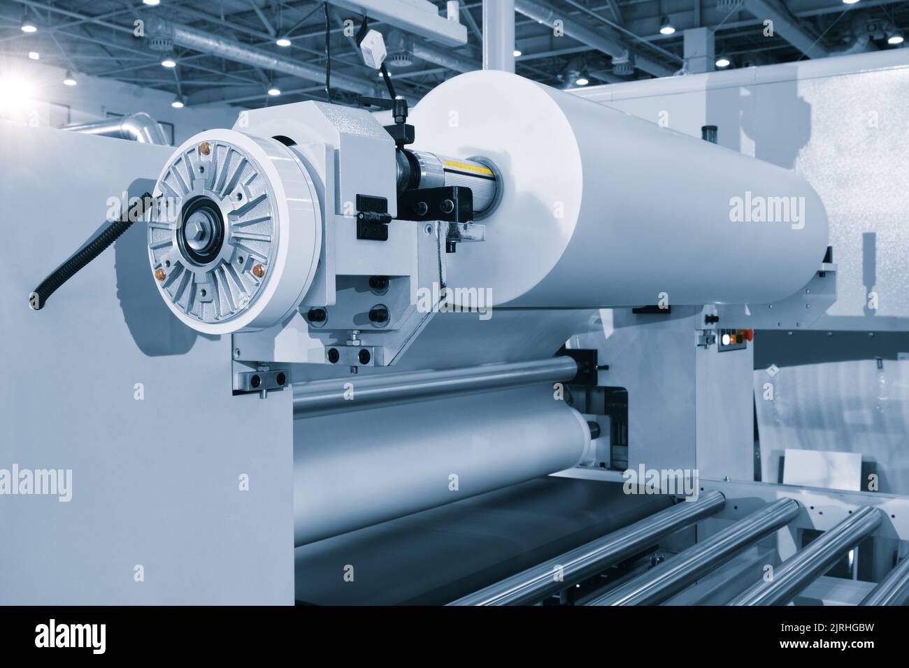 The operation of automatic plastic packaging production machine. roller