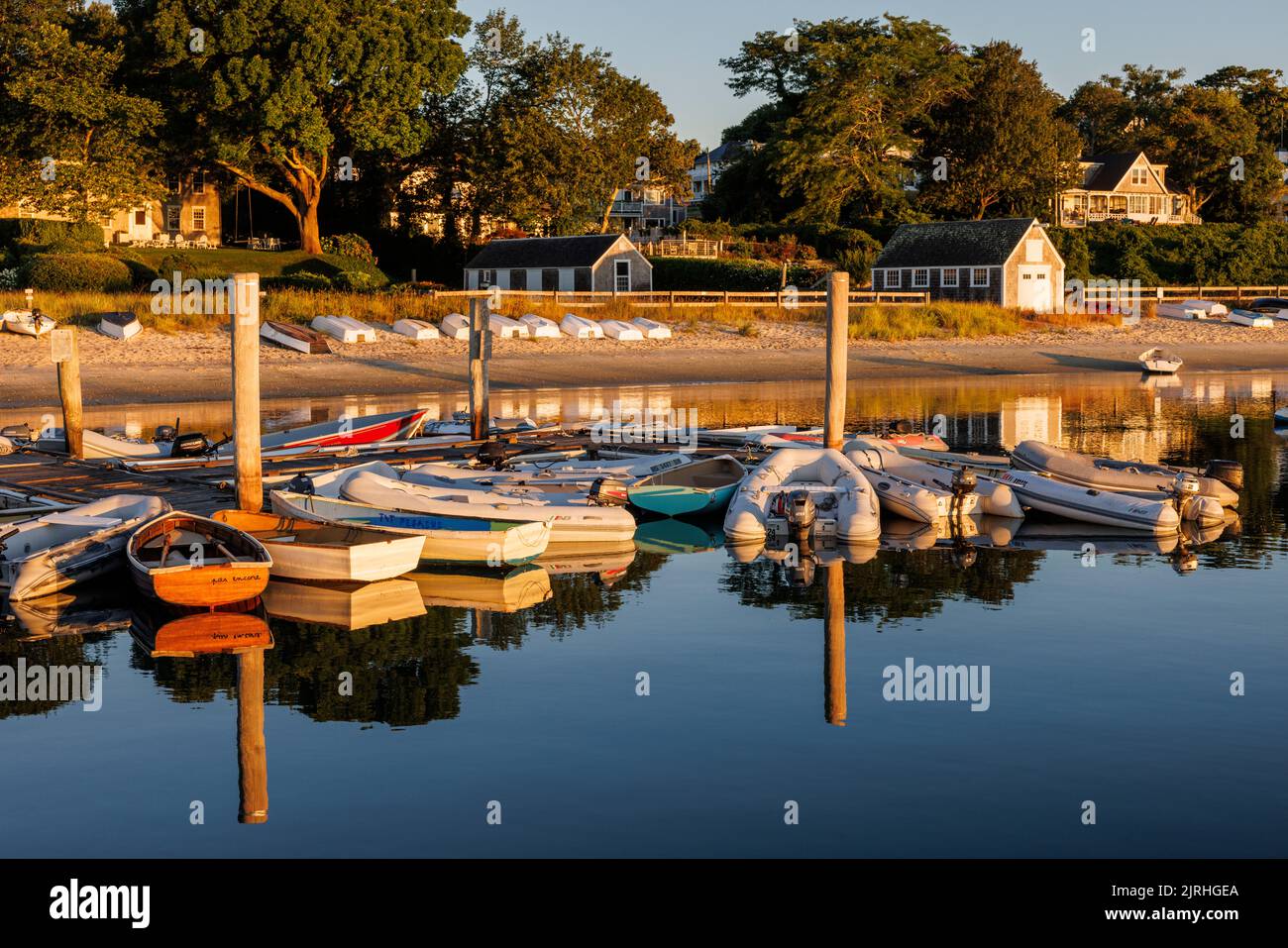 Dinghies tied up at Owen Park Town Dock and on nearby Owen Park Beach in Vineyard Haven (Tisbury), Massachusetts on Martha's Vineyard. Stock Photo