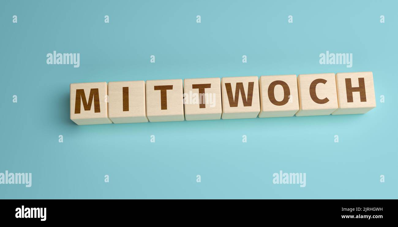 The German word Mittwoch (Wednesday) built from letters on wooden cubes. High angle view with copy space Stock Photo