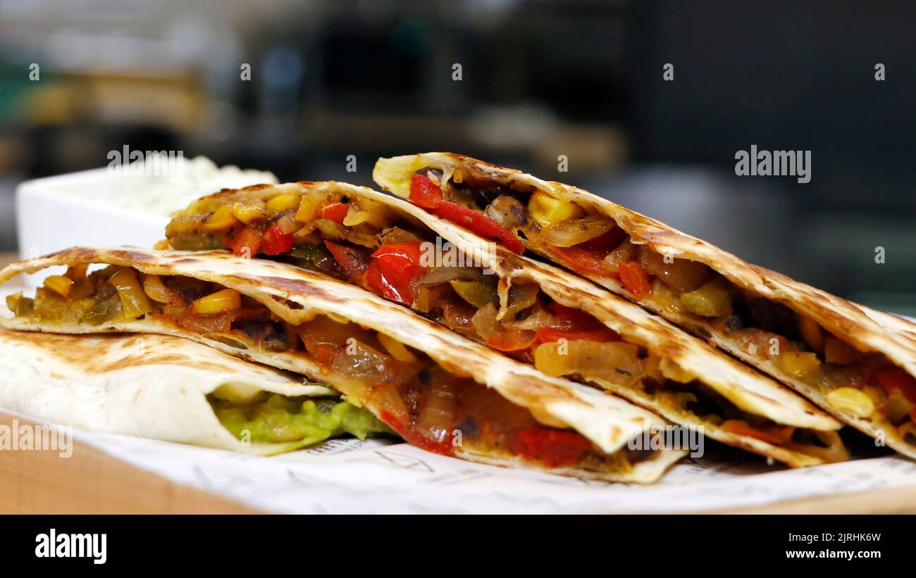 mexican quesadilla sandwich, saute vegetables wrapped with tortilla