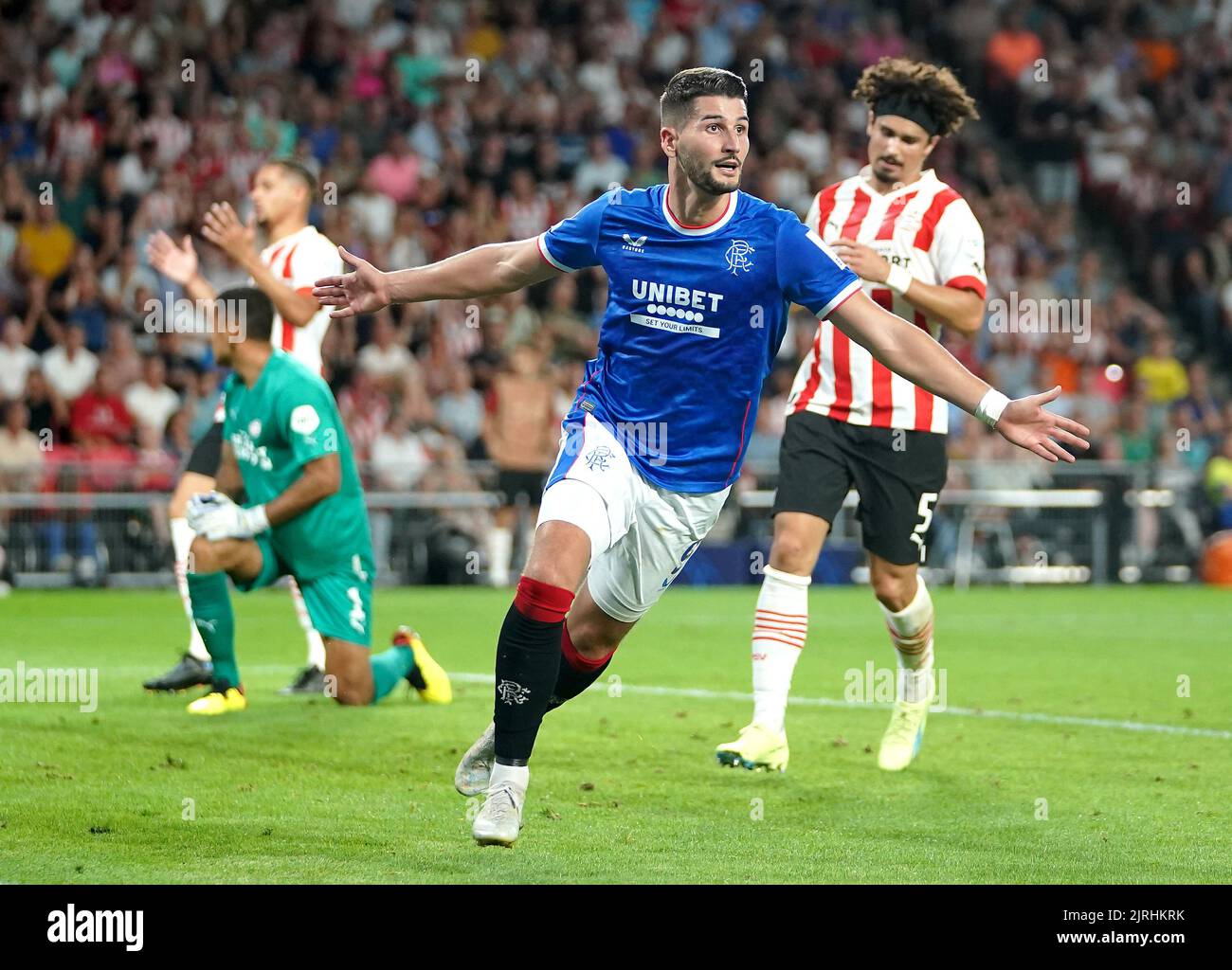 Rangers' Antonio-Mirko Colak celebrates scoring their side's first goal of the game (3-2 on aggregate) during the UEFA Champions League qualifying match at PSV Stadion, Eindhoven. Picture date: Wednesday August 24, 2022. Stock Photo