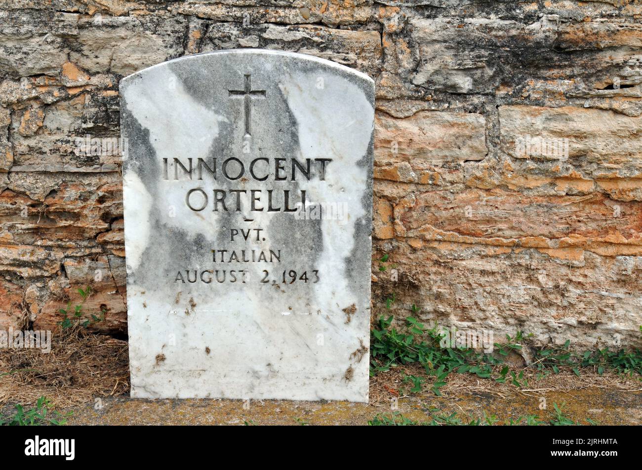 The grave of an Italian soldier in the historic cemetery at Fort Reno, Oklahoma. The fort served as a prisoner of war camp during World War II. Stock Photo