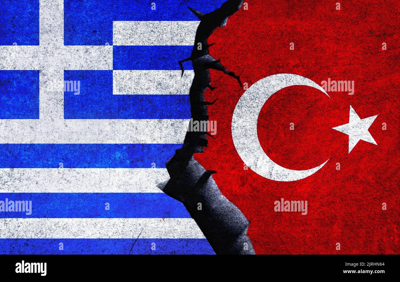 Turkey vs Greece concept flags on a wall with a crack. Greece and