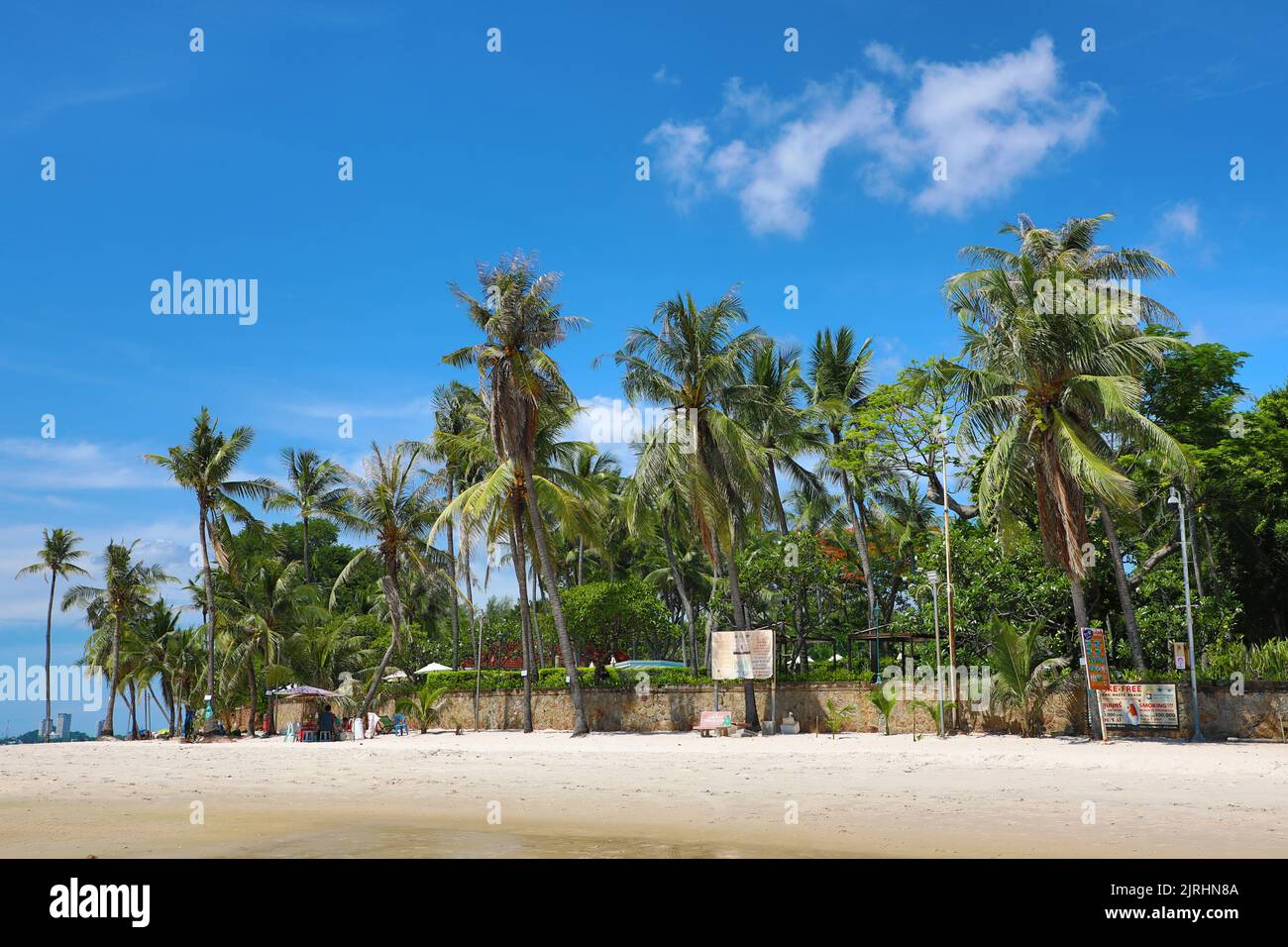 Tropical palm tree beach at Hua Hin, Thailand Stock Photo