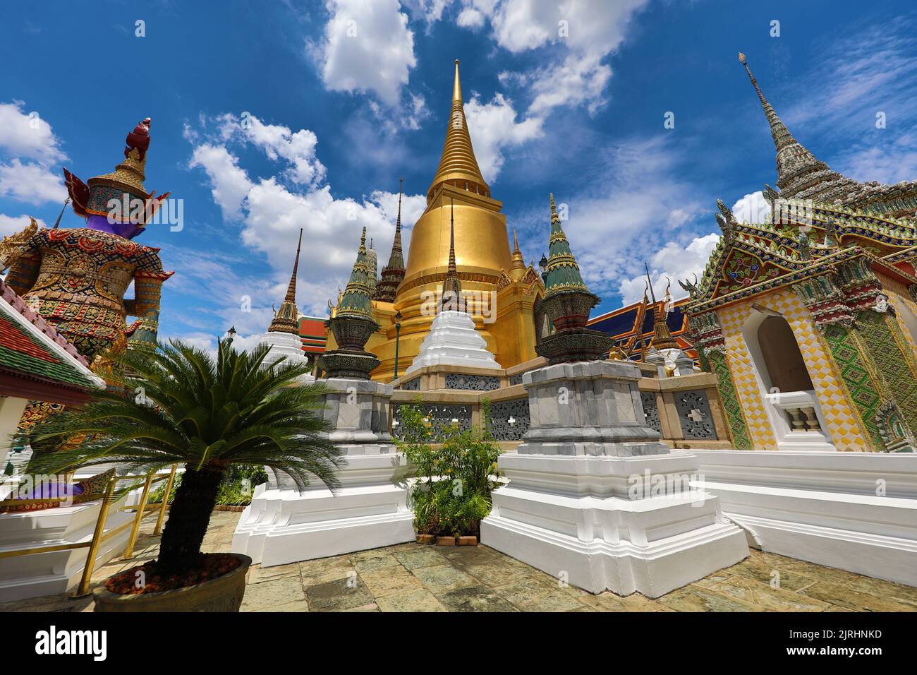 Golden Phra Si Rattana Chedi at Wat Phra Kaew, Temple of the Emerald Buddha, Bangkok, Thailand Stock Photo