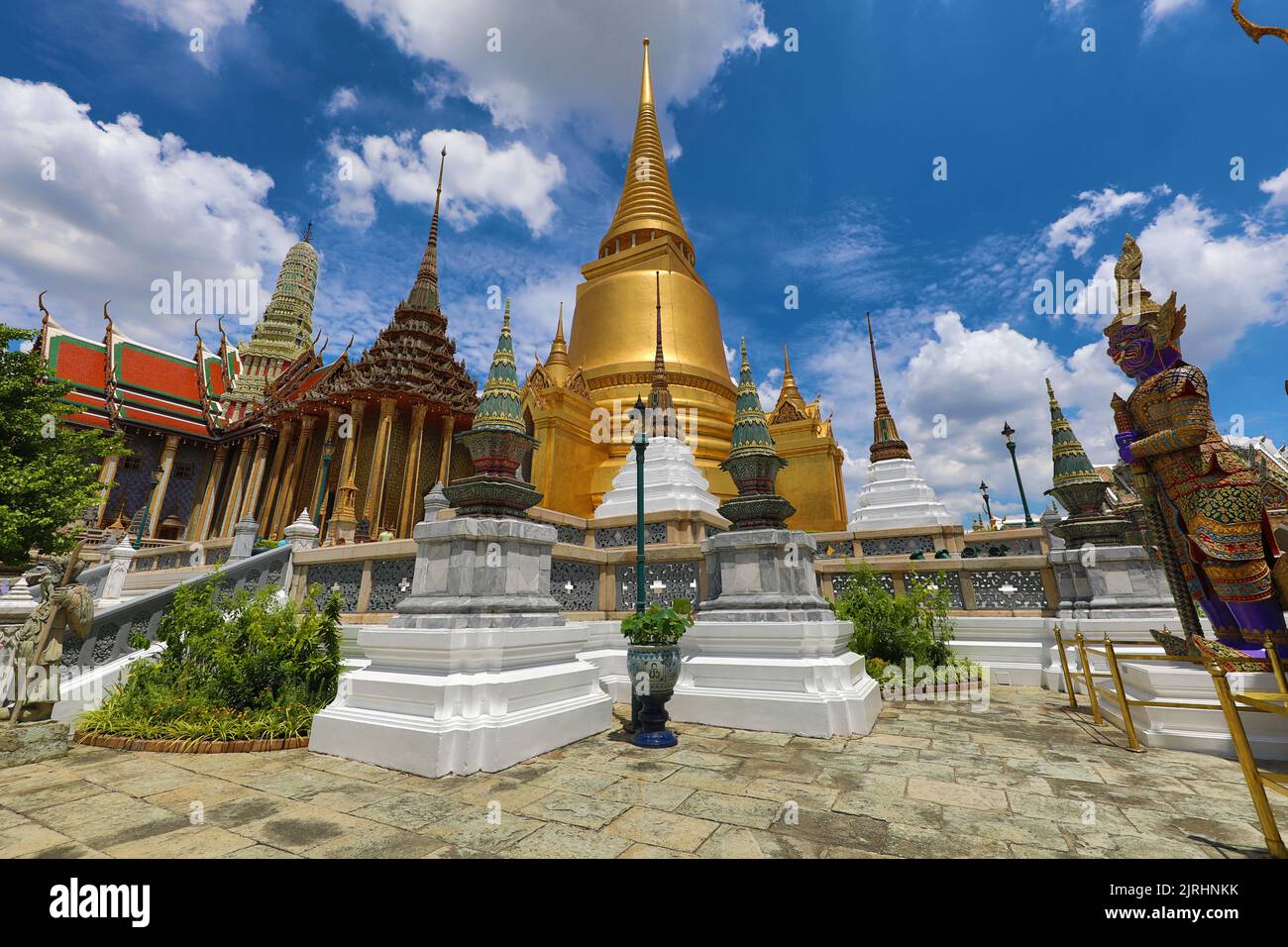 Golden Phra Si Rattana Chedi at Wat Phra Kaew, Temple of the Emerald Buddha, Bangkok, Thailand Stock Photo