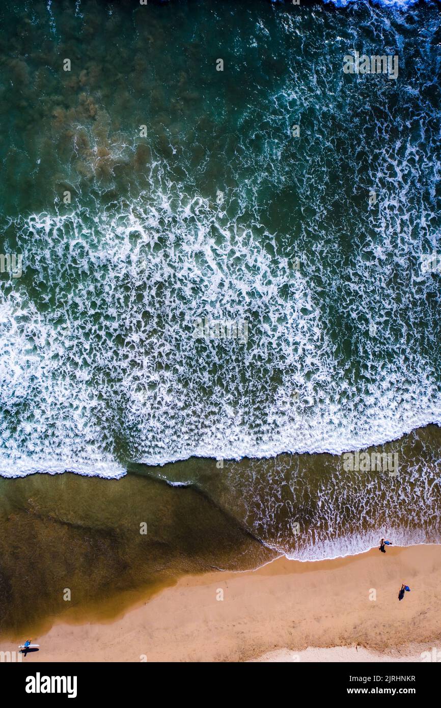 Aerial view of beach and Surfers in Guanacaste, Costa Rica Stock Photo