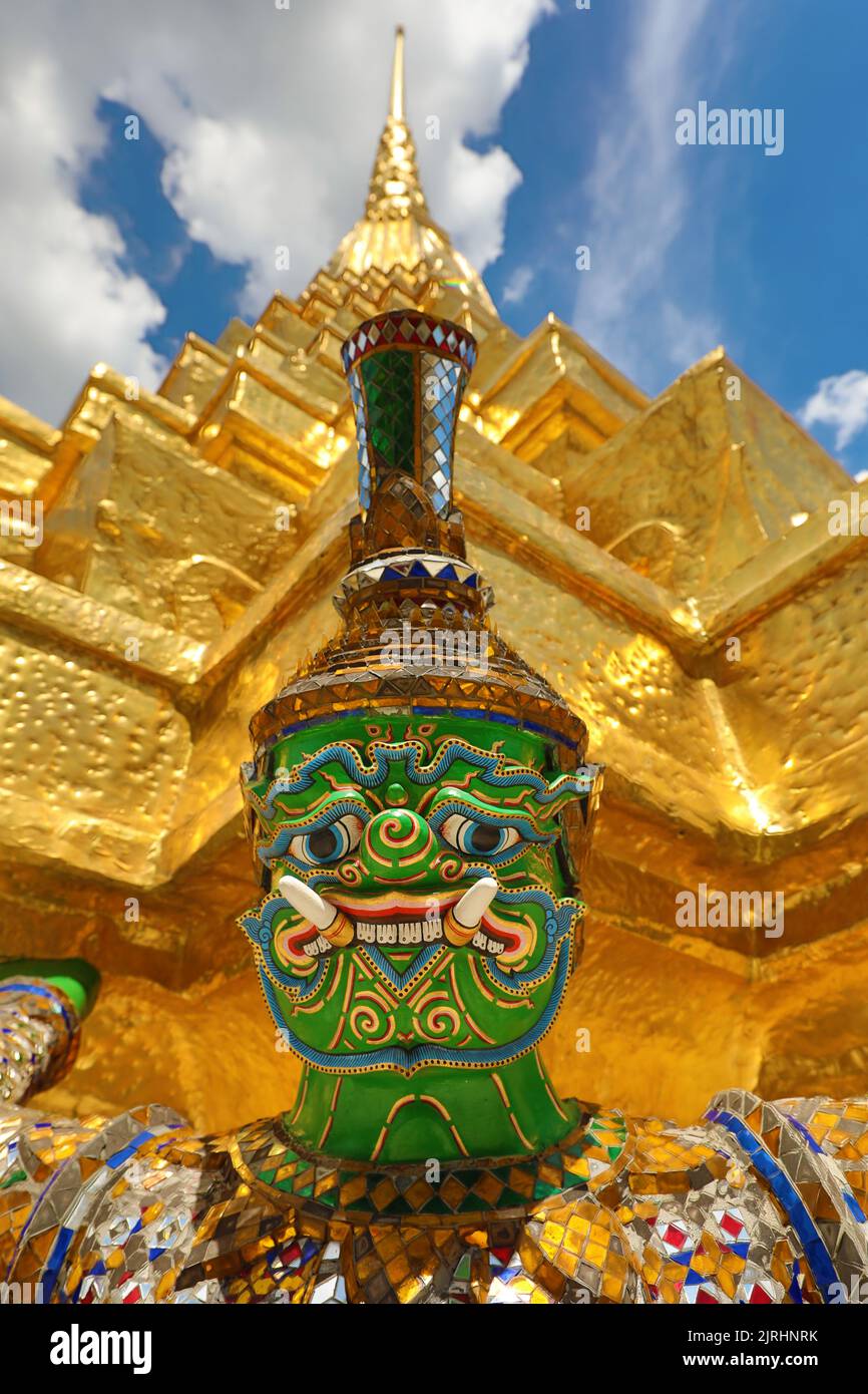 Yaksha Demon Statue on a golden chedi, Phra Suvarnachedi, at Wat Phra Kaew, Temple of the Emerald Buddha, Bangkok, Thailand Stock Photo
