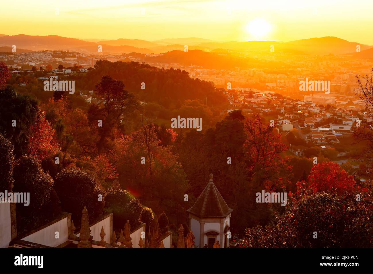 Scenic sunset view from Bom Jesus church staircase, Braga landscape in sunshine, Portugal Stock Photo