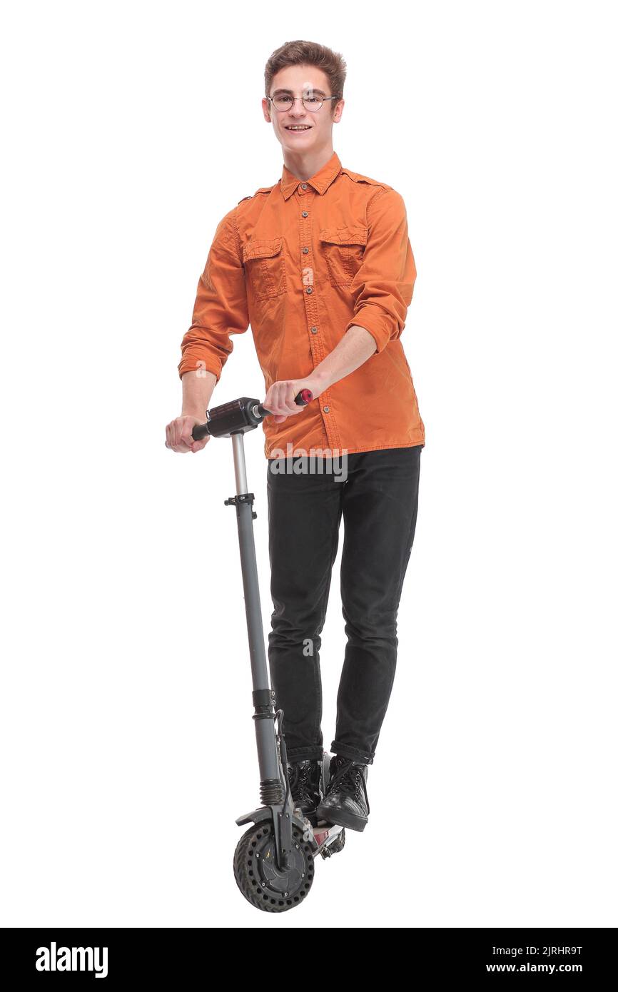 Pleasant smiling man riding a kick scooter Stock Photo