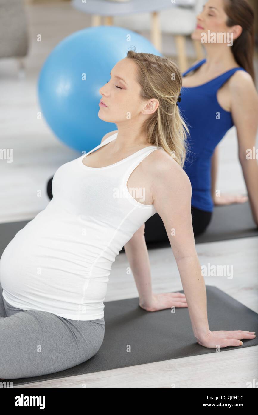 pregnant woman in yoga class Stock Photo Alamy