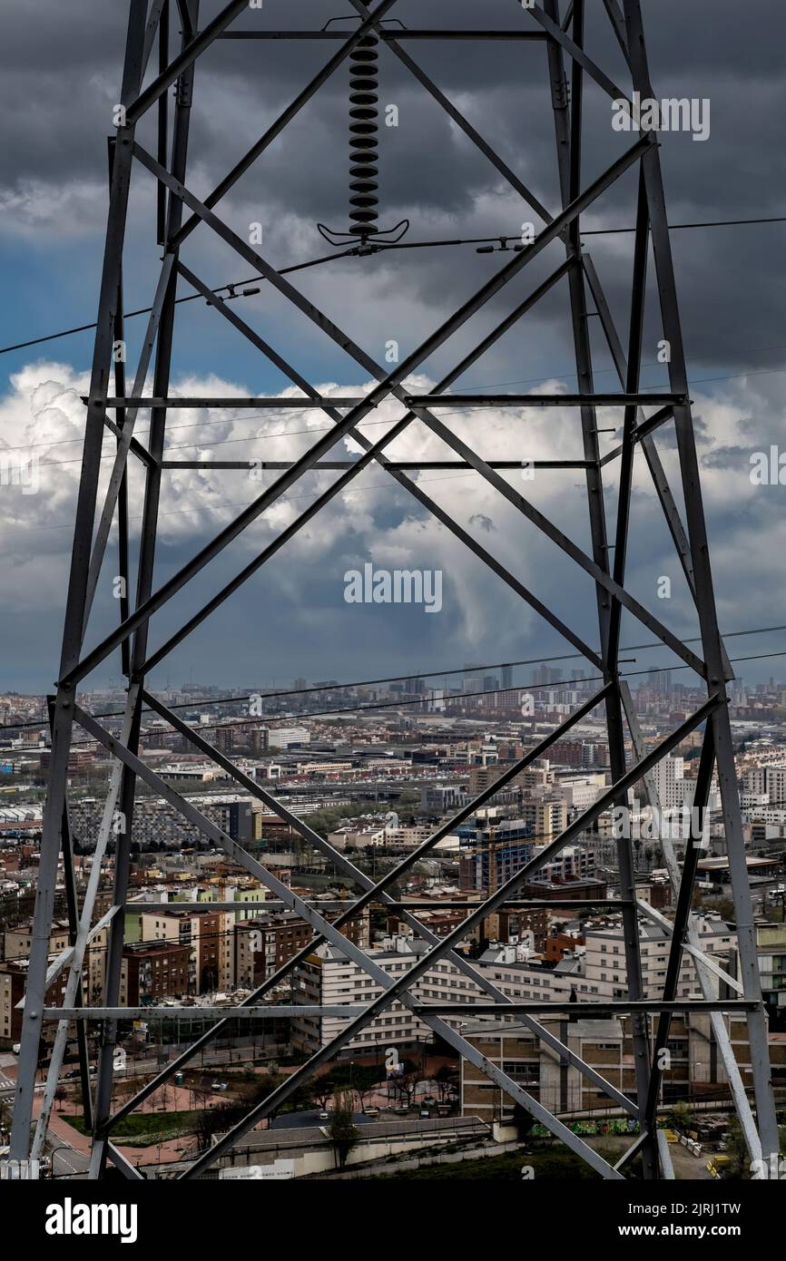 A tower of highvoltage cables with a view of Barcelona in the