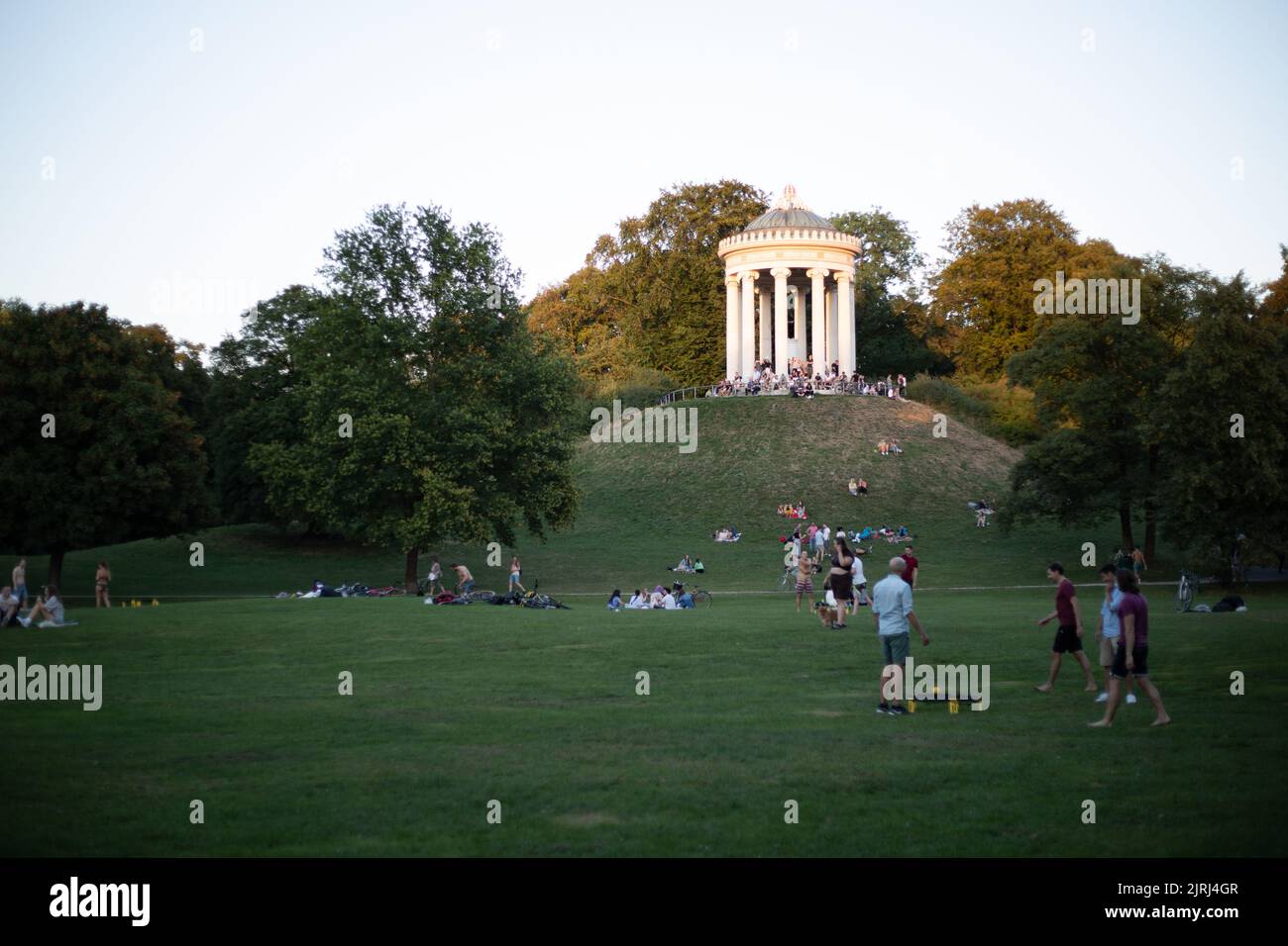 The people enjoy the summer evening in Cafés, Bars, Restaurants and in