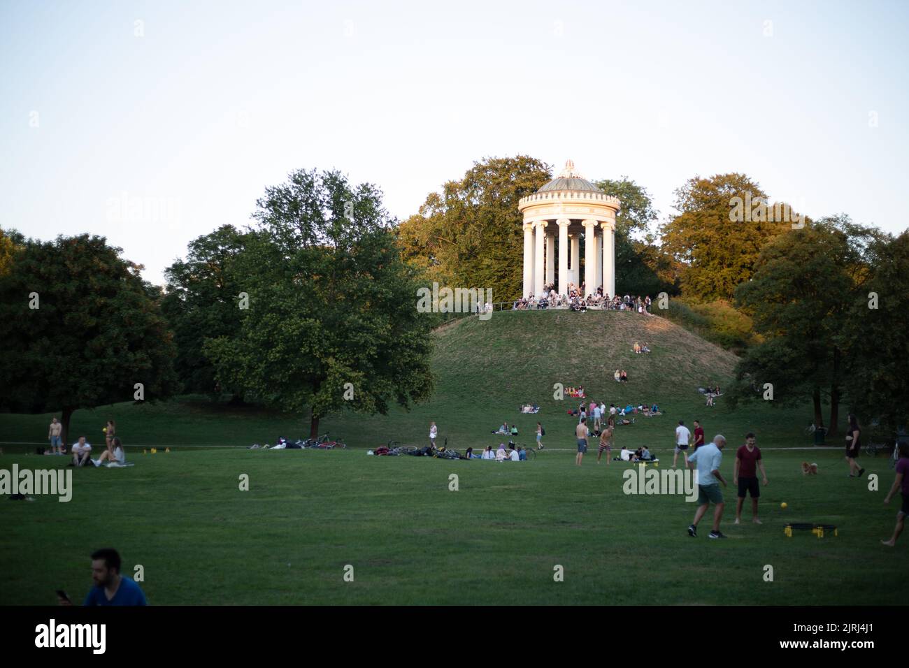 The people enjoy the summer evening in Cafés, Bars, Restaurants and in