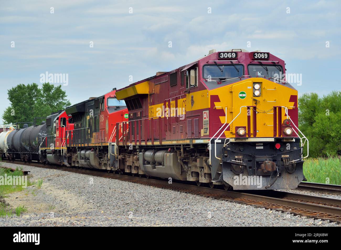 Hoffman Estates, Illinois, USA. Waiting on a passing siding to allow another freight train to pass. Stock Photo
