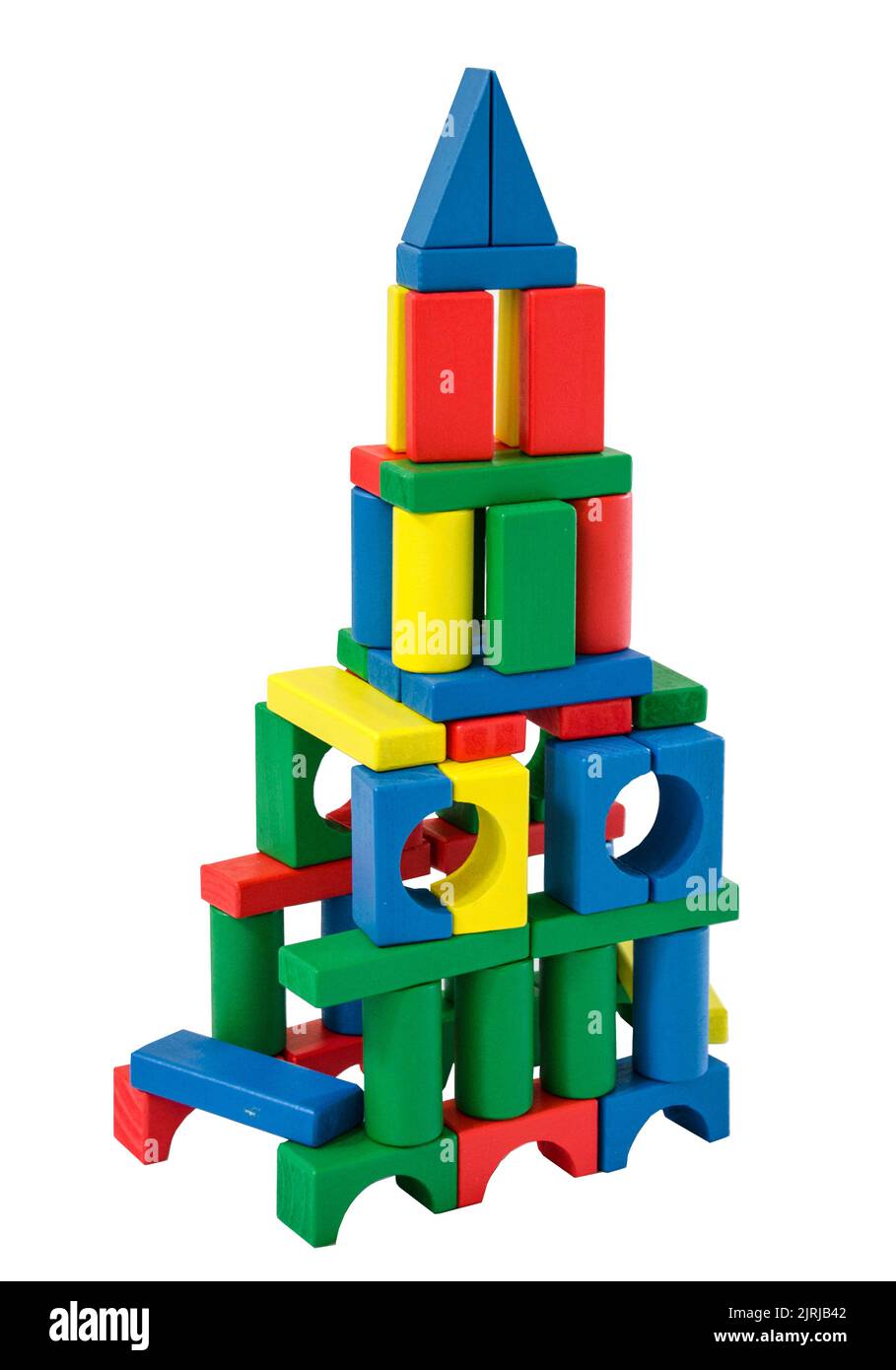 child's version of a turreted house or space station made of coloured wooden building blocks on white backdrop Stock Photo