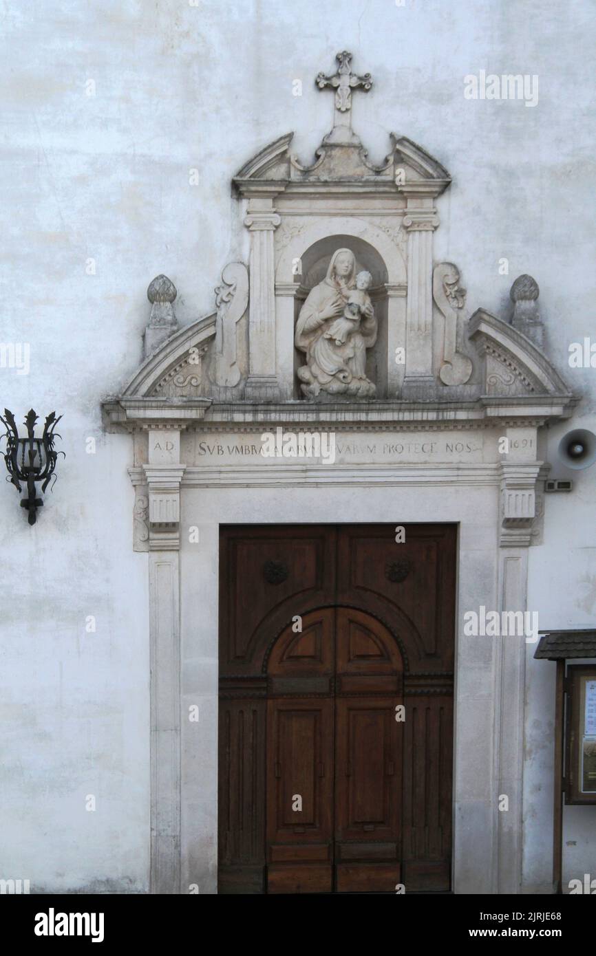 Exterior view of Santuario Madonna della Vetrana (17th century), BA, Italy. Beautiful pediment above the main portal. Stock Photo