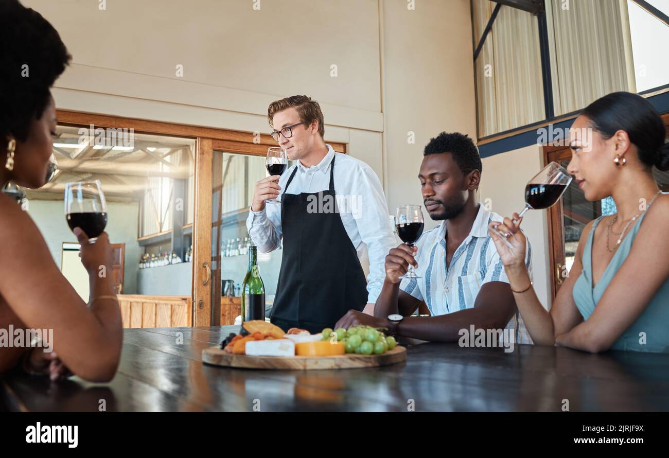 Hospitality, luxury and wine tasting at a restaurant with a