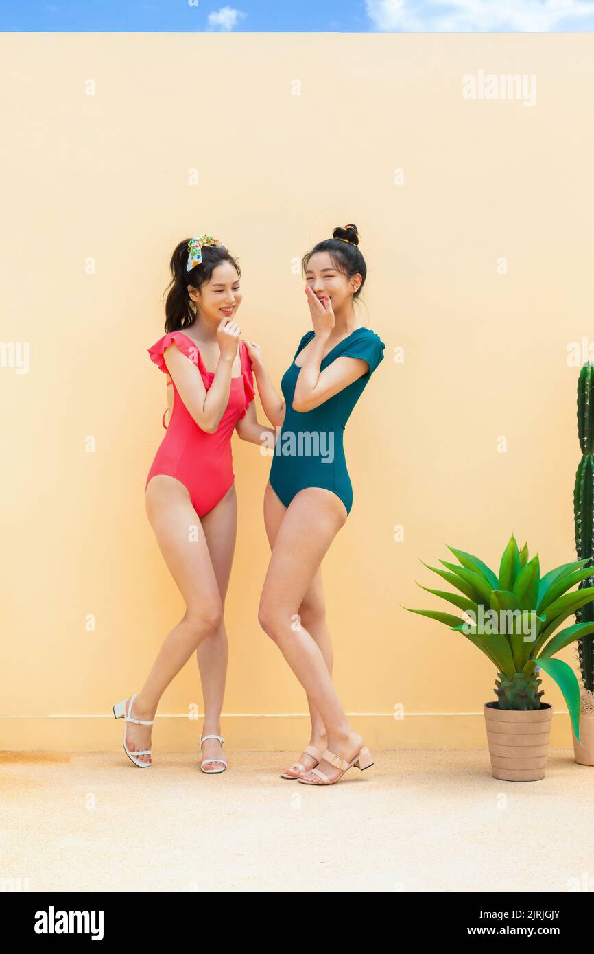 summer vacation trip with friends concept series korean beautiful asian young women smiling in monokini swimsuits Stock Photo