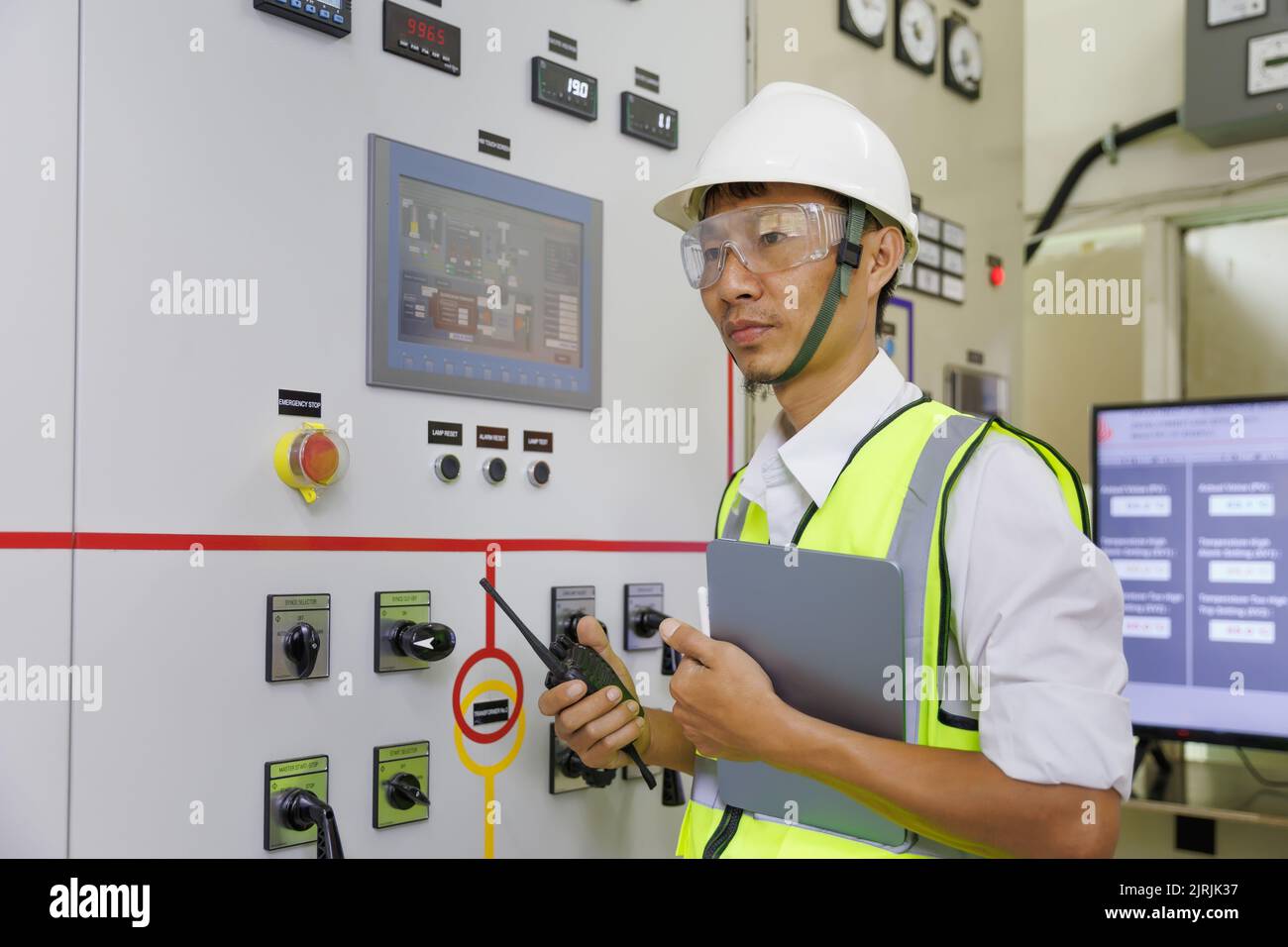 Engineer working on the checking status switchgear electrical energy