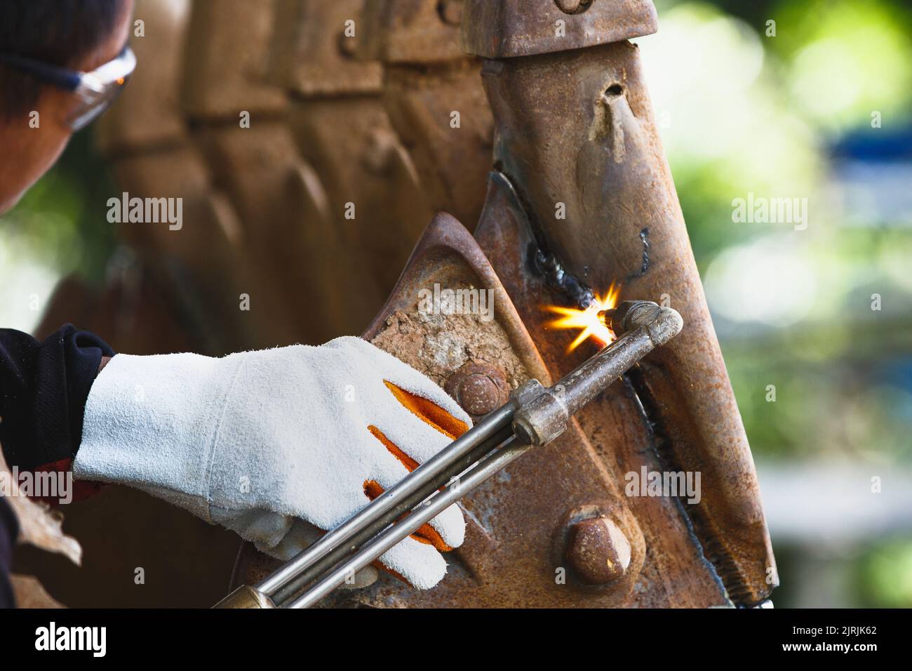 Cutting a steel with a gas torch. Gas welding and oxy-fuel cutting are