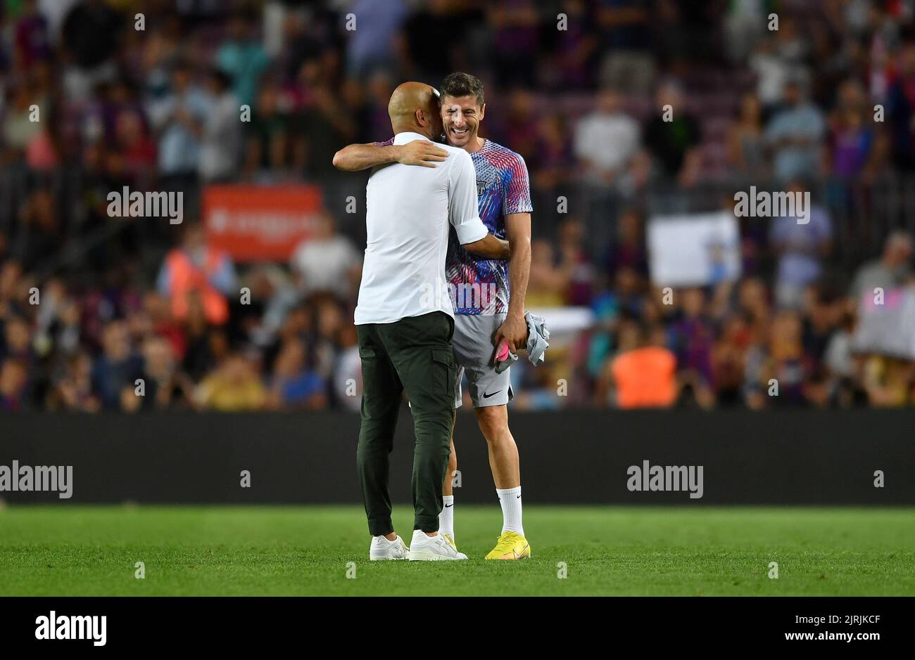 Barcelona,Spain.24 August,2022.  FC Barcelona v Manchester City  Pep Guardiola (head coach) of Manchester City and Robert Lewandowski (9) of FC Barcelona at the end of the friendly match between FC Barcelona and Manchester City in support of the cause of former goalkeeper and coach Juan Carlos Unzué, who was diagnosed with ALS (amyotrophic lateral sclerosis) more than two years ago at Spotify Camp Nou Stadium in Barcelona, Spain. Stock Photo
