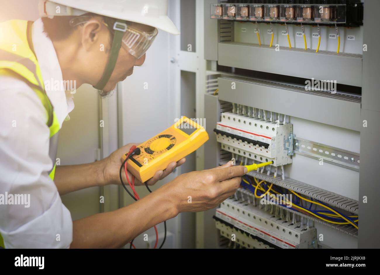 Electrical engineers test the voltage and current of the wires in the
