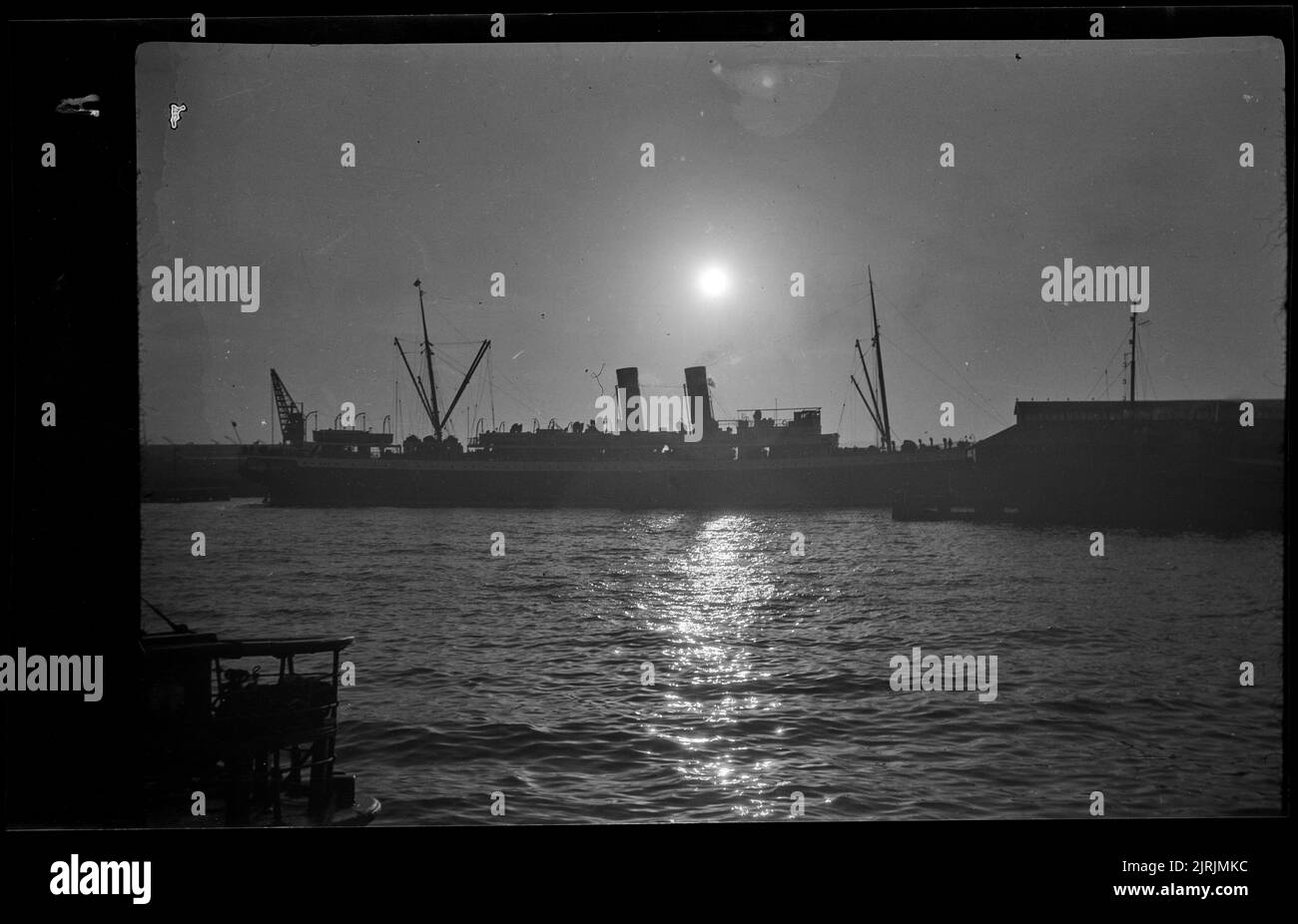 [Ship moored in Wellington harbour], 1920s-1930s, Wellington, by Roland Searle. Stock Photo