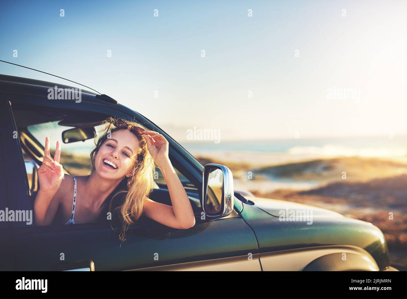 The open road can take you anywhere. Cropped portrait of an attractive ...