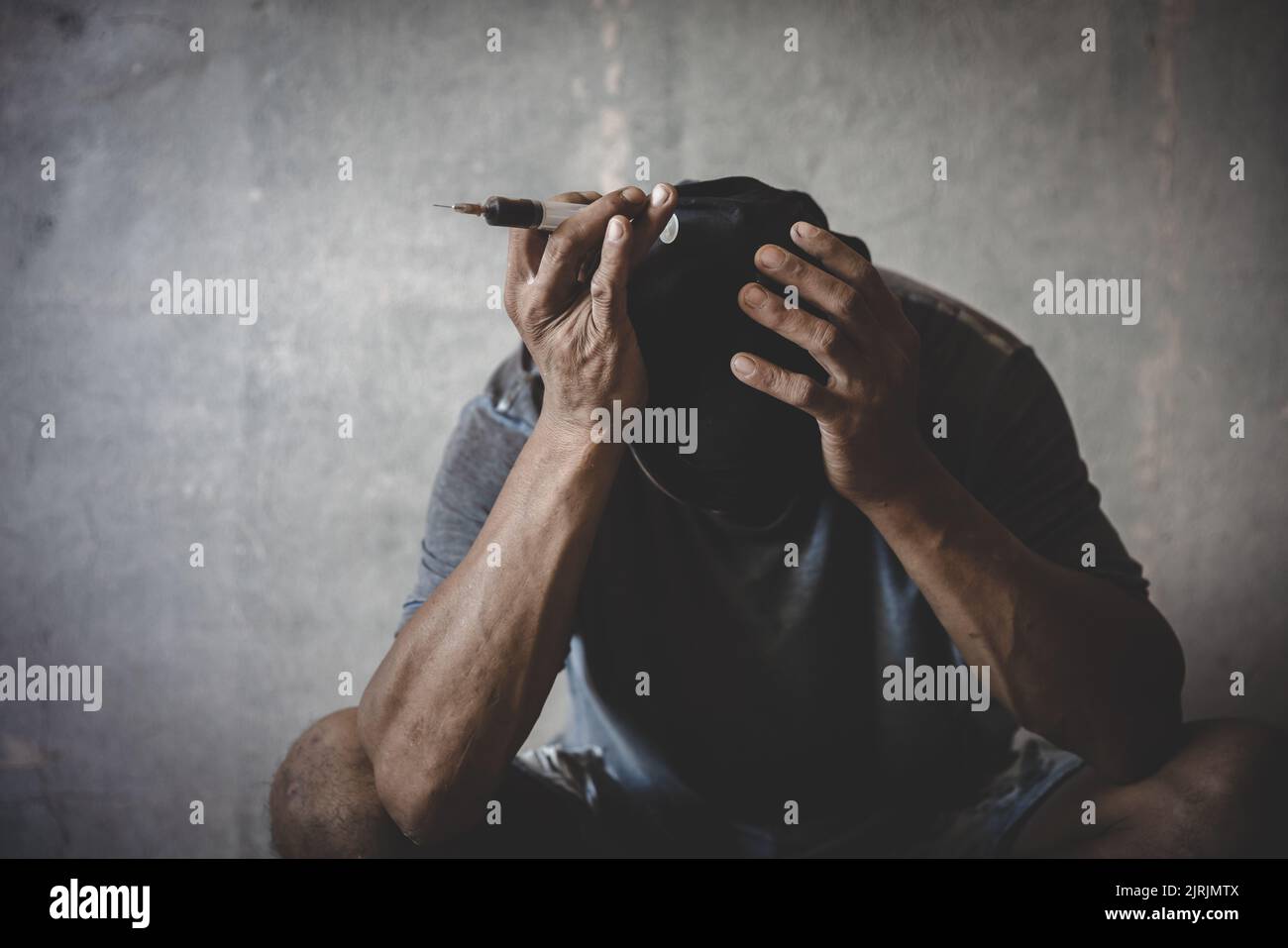 Drug addict man with hallucinations, Drug addict man with syringe using