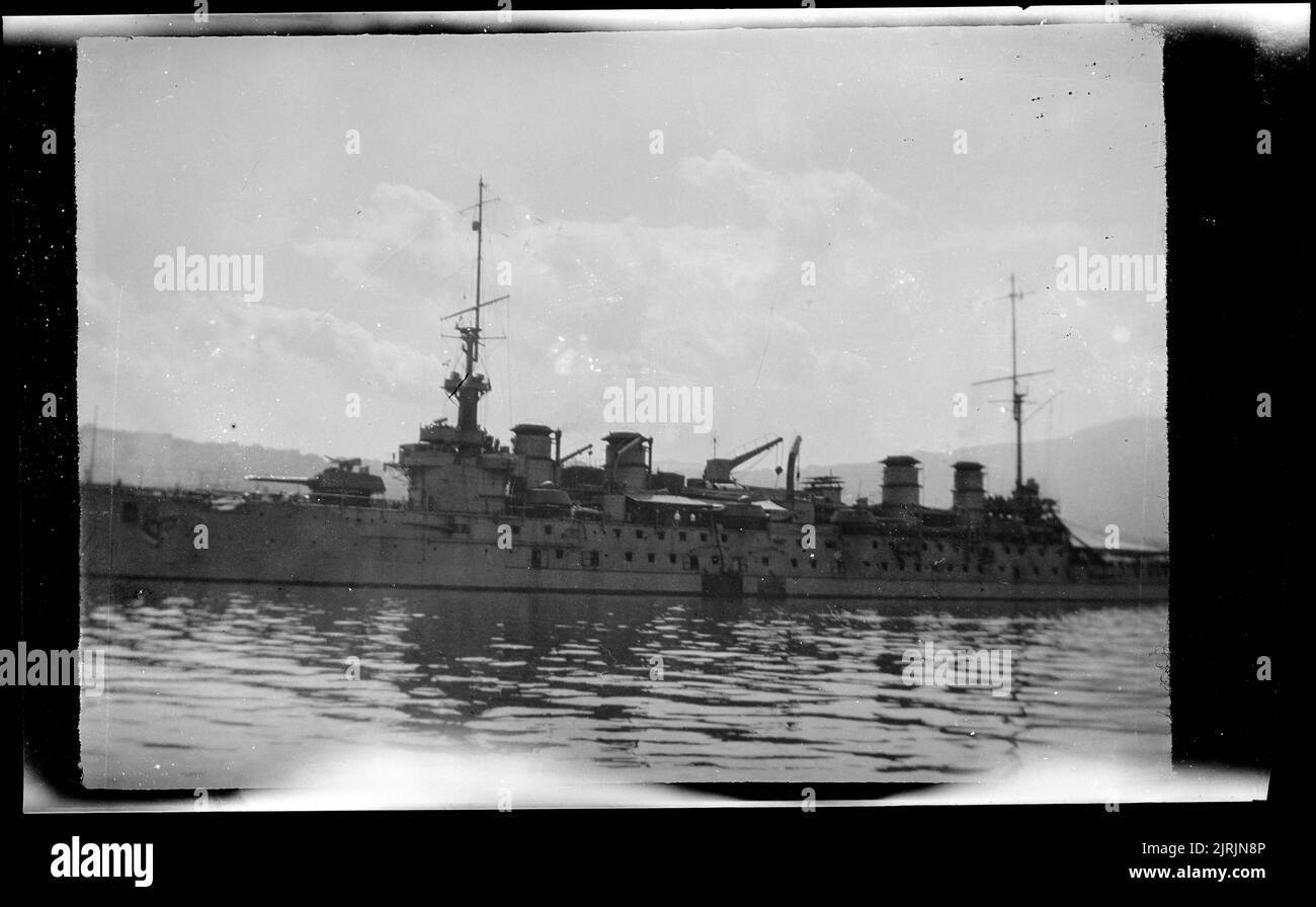 [Battleship moored in Wellington harbour], 1920s-1930s, Wellington, by Roland Searle. Stock Photo