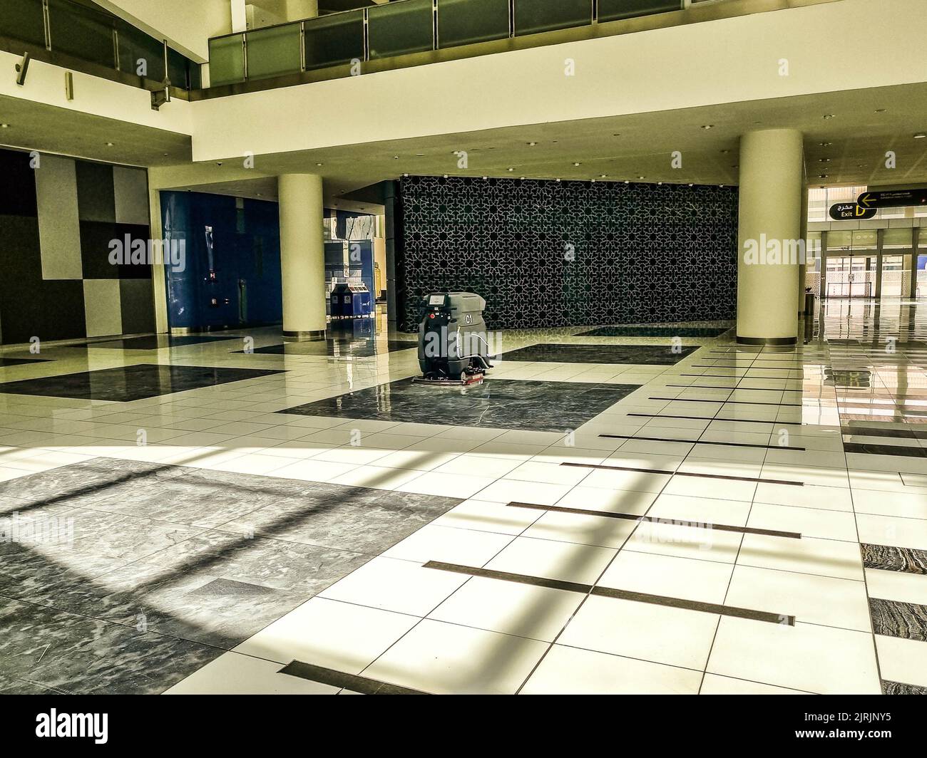 Abu Dhabi, UAE 08.04.2022 Robotic cleaning machine in the hall way