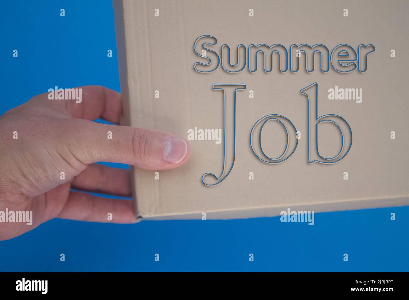 Summer Job word with cardboard box. Brown folded cardbox Stock Photo
