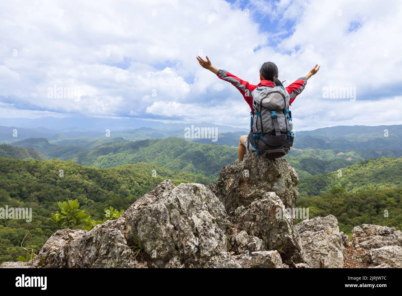 Active climbers enjoy the scenery. Male and female backpackers with