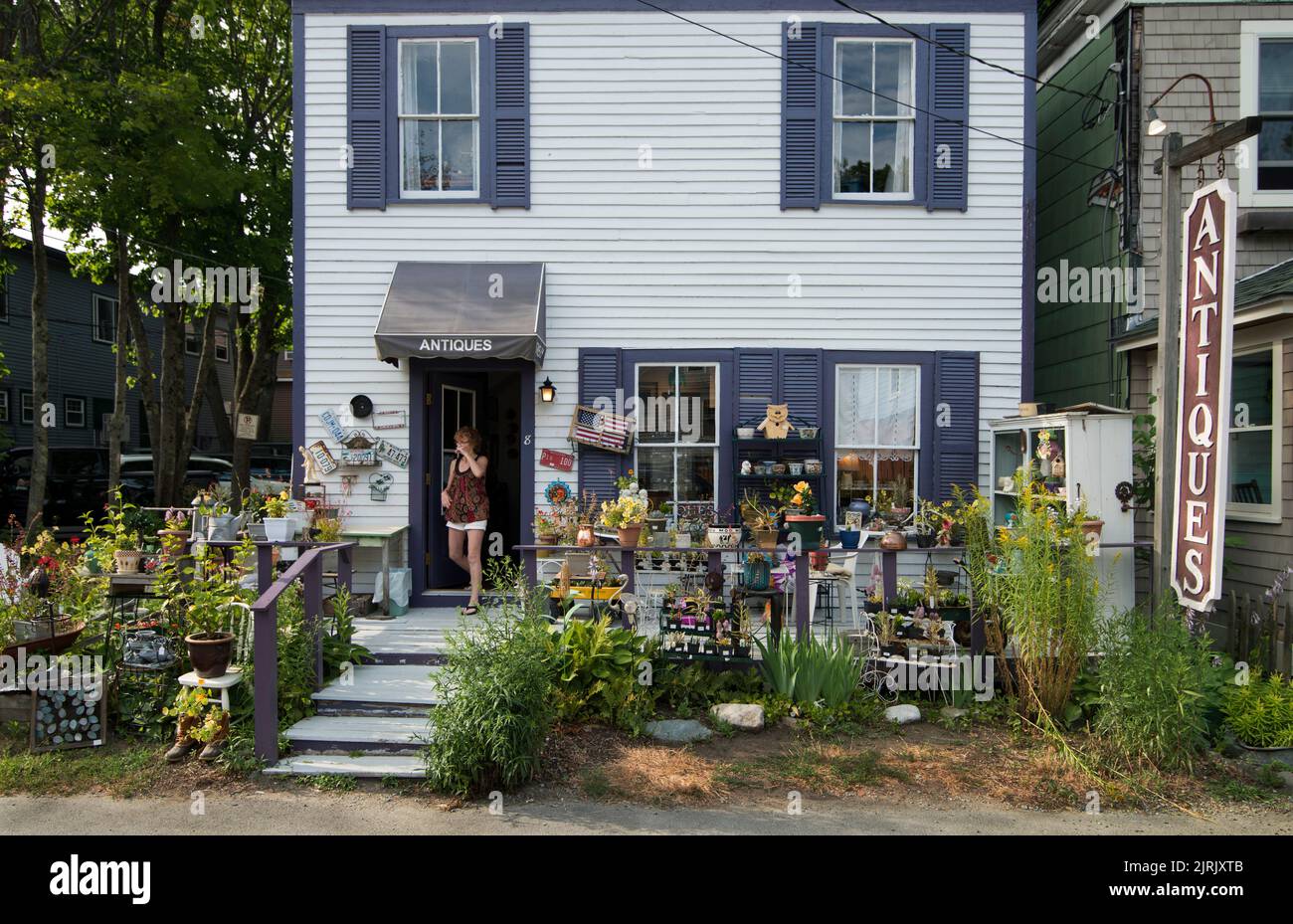 Bar Harbor, Maine, USA. One of the numerous Antique shops on a small residential street, known as Antique Alley, off of Main Street. Stock Photo