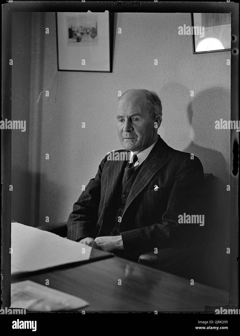 Mr P Sim KC in his office, May 1946, Wellington, by J.W. Chapman-Taylor. Stock Photo