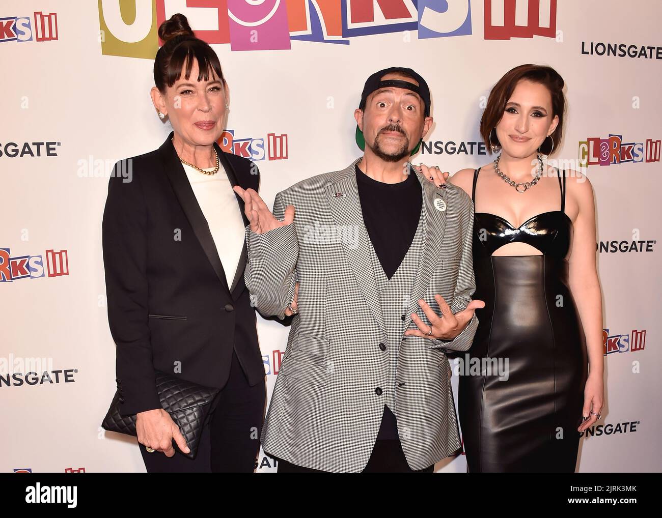 Los Angeles, USA. 24th Aug, 2022. Jennifer Schwalbach Smith, Kevin Smith and Harley Quinn Smith walking the red carpet at the Los Angeles premiere of 'Clerks III' at TCL Chinese 6 Theatres in Los Angeles, CA on August 24, 2022. (Photo By Scott Kirkland/Sipa USA) Credit: Sipa USA/Alamy Live News Stock Photo