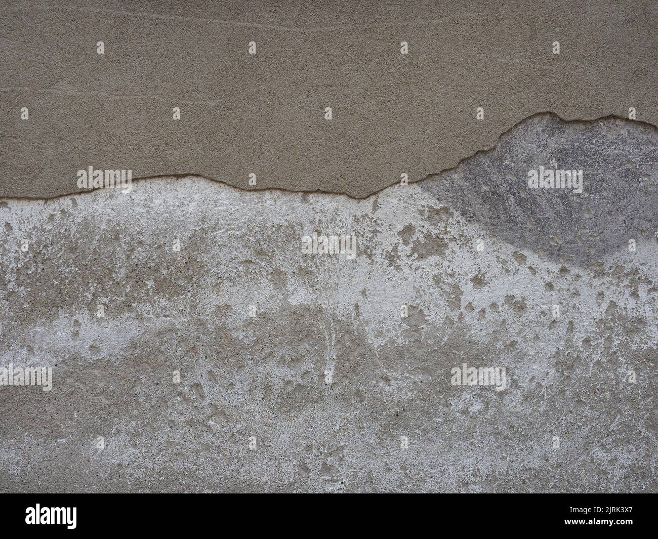 plaster peeling off a damaged wall surface Stock Photo Alamy