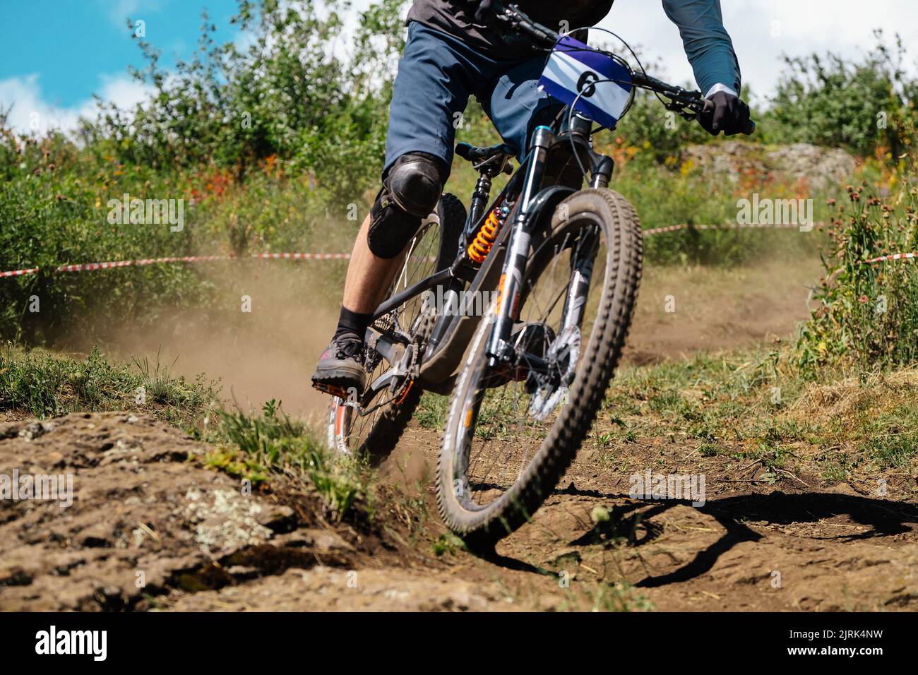 mountain bike racer trail downhill competition Stock Photo