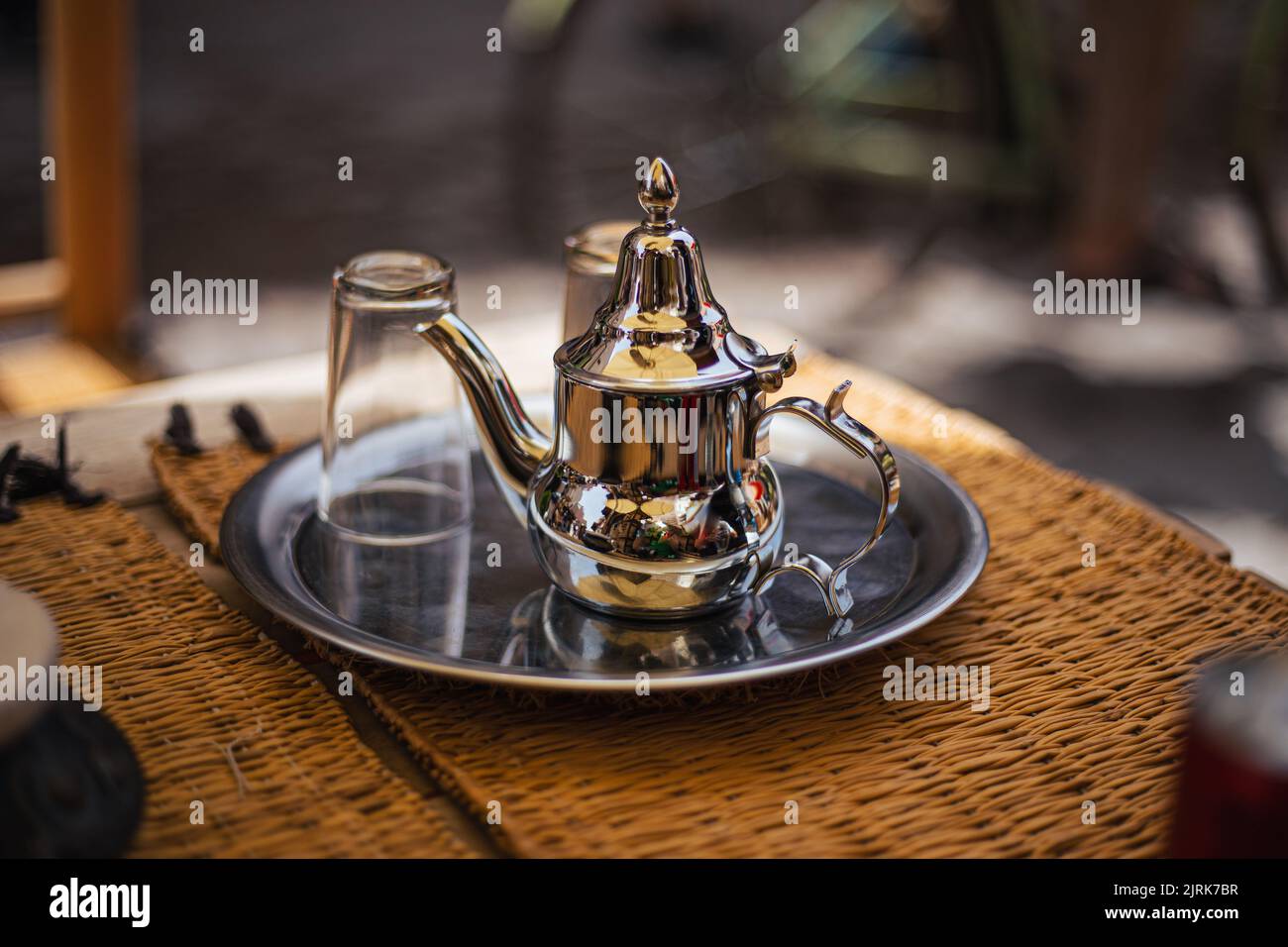 Silver shining tea pot in Arabian style Stock Photo