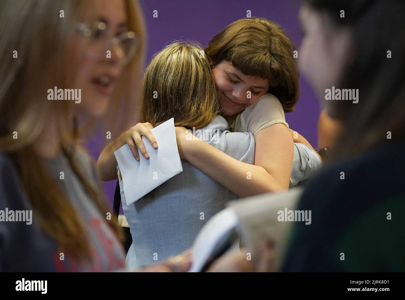Students congratulate each other receiving their GCSE results at ...