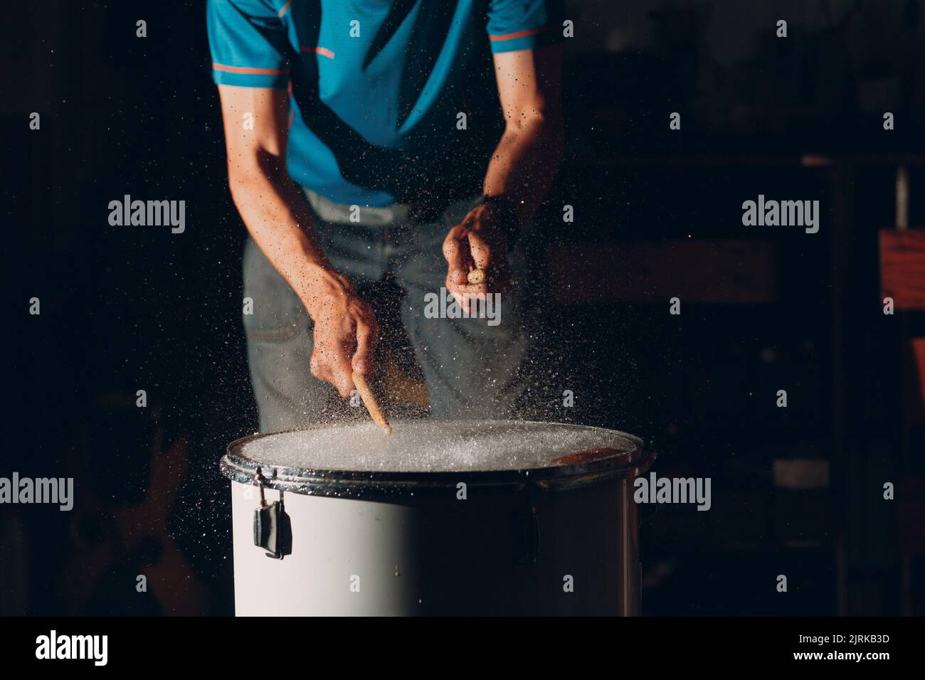 Close up drum sticks drumming hit beat rhythm on drum surface with