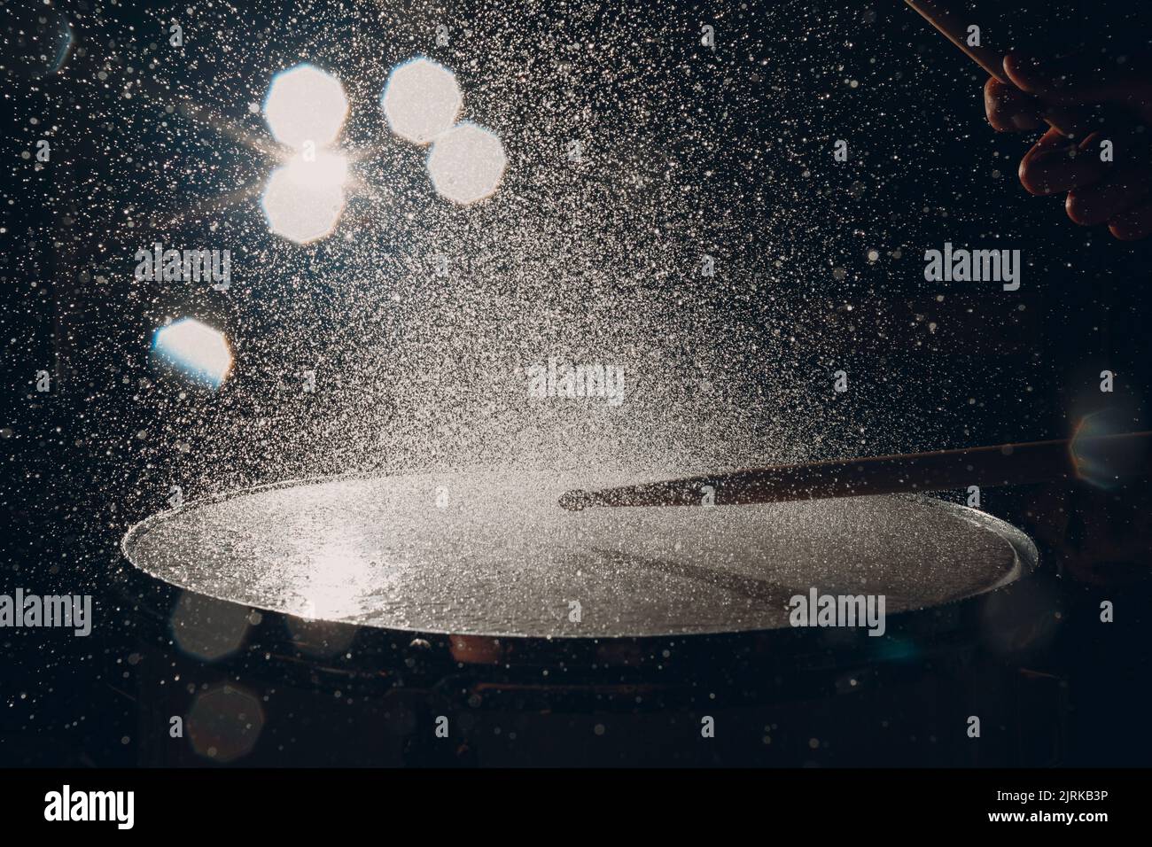 Close up drum sticks drumming hit beat rhythm on drum surface with