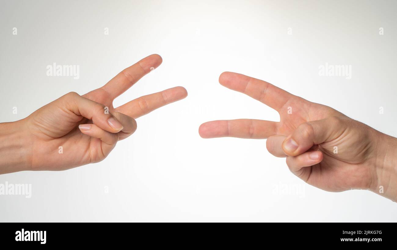 Hands close-up gesture from the game rock paper scissors. High quality photo Stock Photo